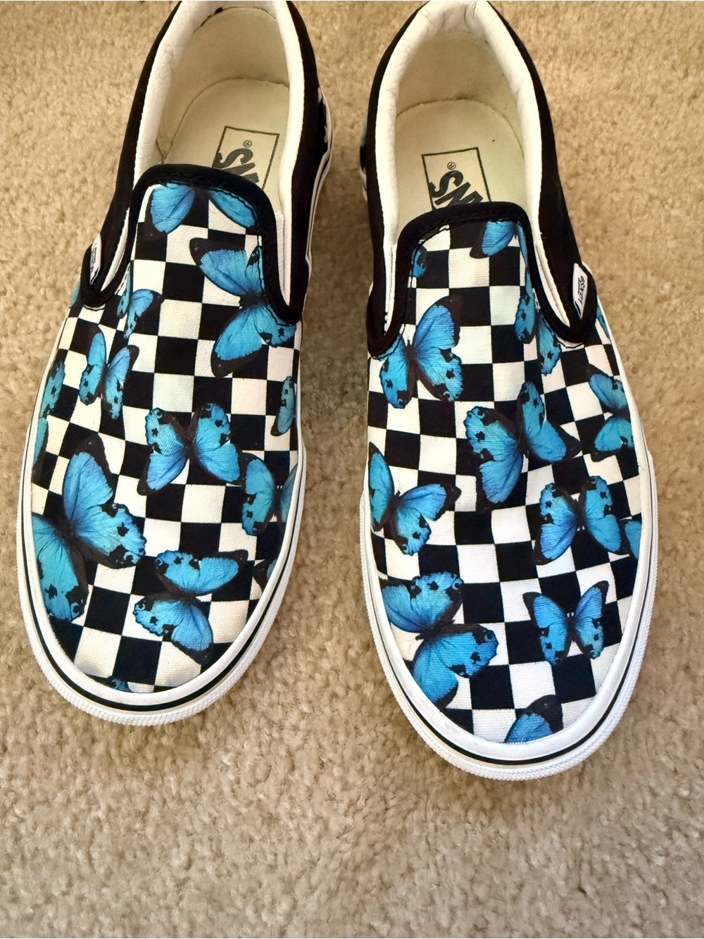 Vans Slip-On Sneakers in Black, White & Bright Blue Butterfly Print